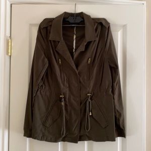 Women’s zippered front jacket with drawstring waist. Size M.